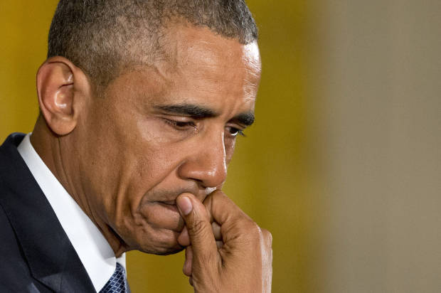 An emotional President Barack Obama pauses as he speaks about the youngest victims of the Sandy Hook shootings, Tuesday, Jan. 5, 2016, in the East Room of the White House in Washington, where he spoke about steps his administration is taking to reduce gun violence. (AP Photo/Jacquelyn Martin)