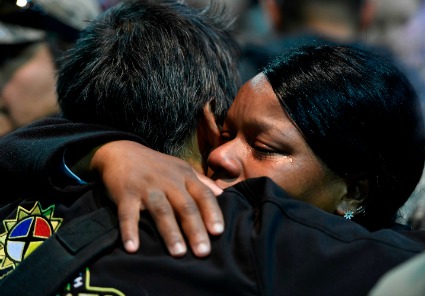 vet_tatiana_mclee_hugs_sioux_